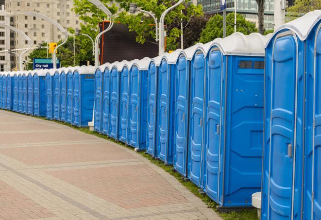 a line of portable restrooms at an outdoor wedding, catering to guests with style and comfort in Alviso CA